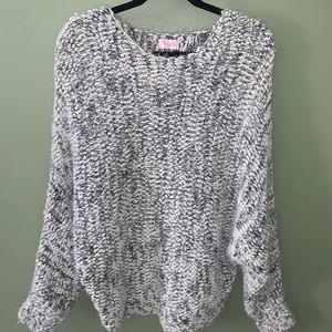 Women’s black and white sweater
